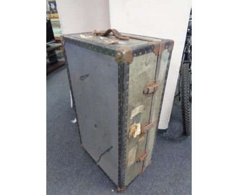 An early 20th century metal bound shipping trunk  
