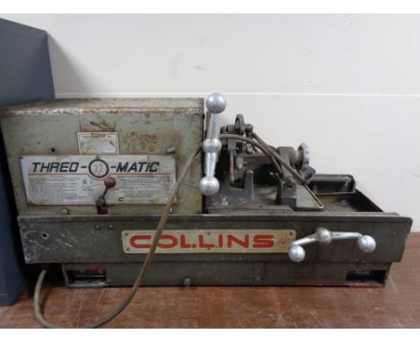 A Collins industrial thread-o-matic pipe threading machine 