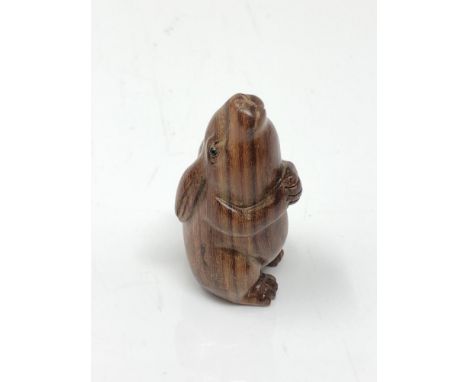 A carved Chinese hardwood netsuke - Rabbit
