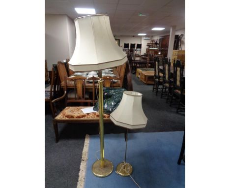 A brass standard lamp and shade, together with a similar table lamp 