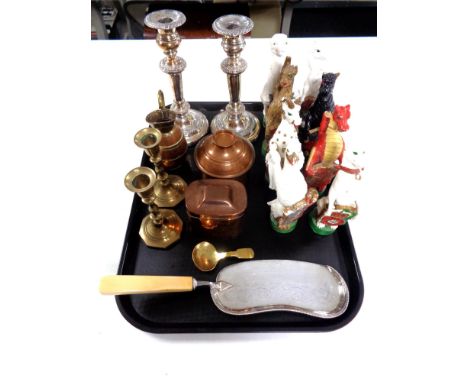 A tray of painted pottery figures of dragons and mythical creatures, plated candlesticks, Art Nouveau copper lidded pot, bras