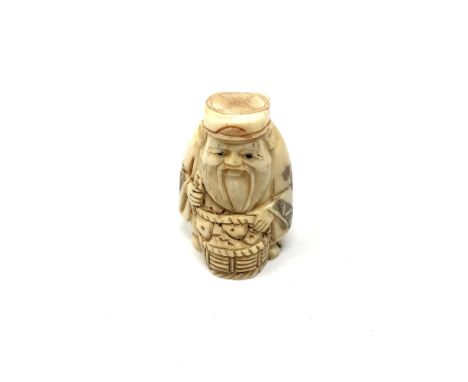 A carved Chinese bone netsuke - Gentleman holding a basket 