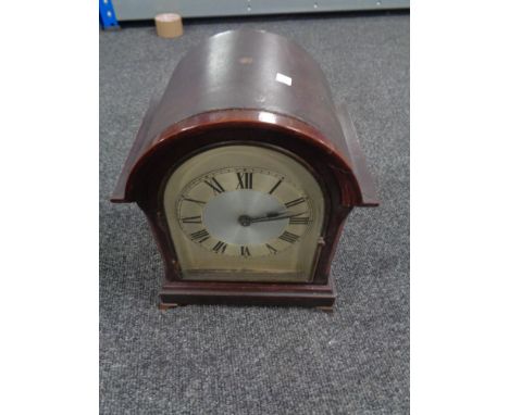An Edwardian bracket clock with silver dial (electric)  