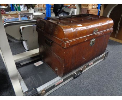 A guitar flight case together with an early 20th century tin trunk 