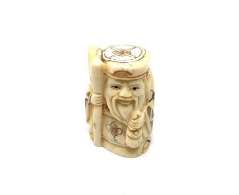 A carved Chinese bone netsuke - Village elder with staff