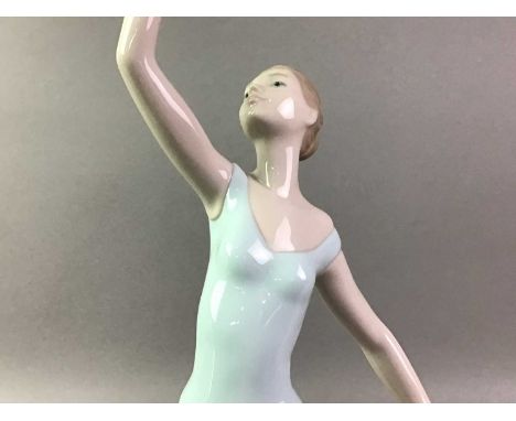 NAO FIGURE  OF THE DANCE IS OVER along with a Lladro figure of a winged cherub with babythe taller 34cm highQty: 2