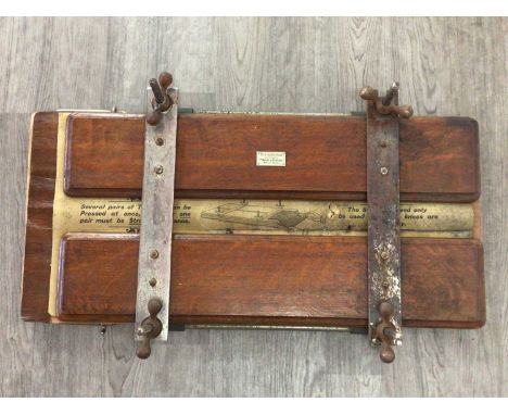 THE NATIONAL AUTOMATIC PRESSER AND STRETCHER ALONG WITH A BONGO DRUM the presser in oak