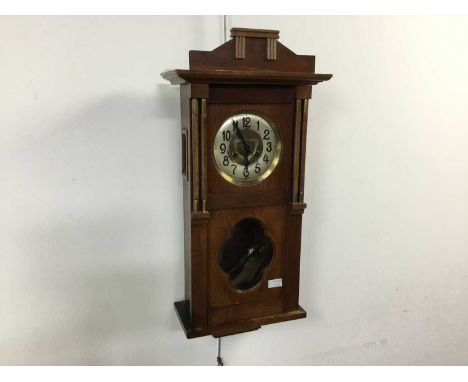 OAK SECESSIONIST WALL CLOCK ALONG WITH A CUCKOO CLOCK the early 20th century wall clock with silvered dialwall clock 78cm hig