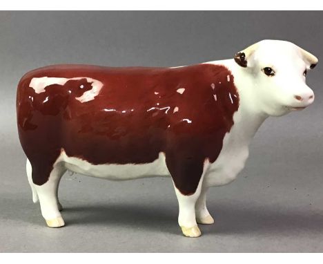 COLLECTION OF CERAMIC AND OTHER ANIMAL FIGURES including dogs, cows, sheep and a swan. Tallest item 21cm