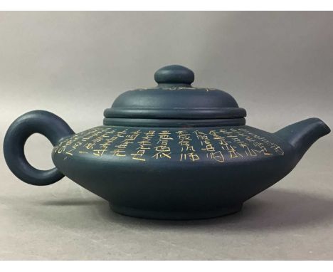 THREE CHINESE YIXING STYLE TEAPOTS ALONG WITH A TEA BOWL also a Victorian carving set with horn handles tallest item 20cm