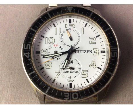 CITIZEN ECO-DRIVE STAINLESS STEEL WRIST WATCH with white enamel dial, subsidiary dials and black bezelAt the time of checking