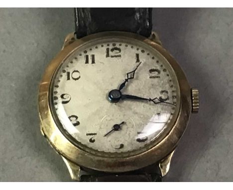 GENT'S GOLD WRIST WATCH EARLY 20TH CENTURY the circular dial with numbers in black and subsidiary seconds, manual wind moveme