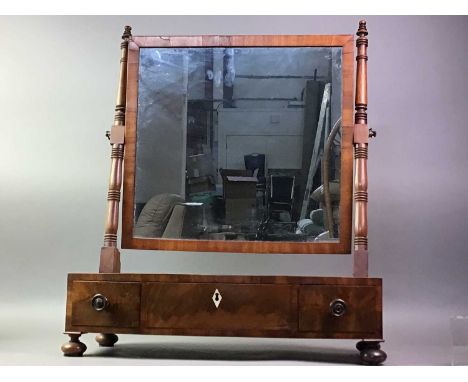 VICTORIAN MAHOGANY TOILET MIRROR the rectangular glass on turned column supports, the base fitted with three drawers and on s