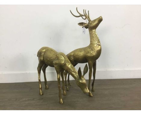 FIRESIDE STAG AND DOE FIGURES ALONG WITH A BRASS STICK STAND the figures formed in brassthe tallest 76cm