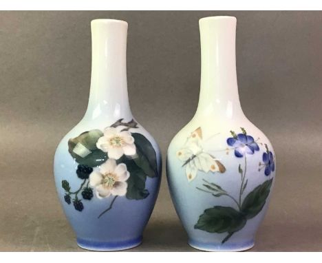 TWO ROYAL COPENHAGEN VASES AND AN OVAL DISH  each with floral decoration on a blue and white groundthe vases each: 14cm highQ