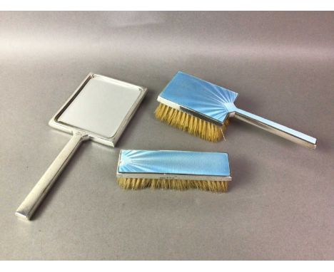 SILVER AND ENAMEL THREE PIECE DRESSING TABLE SET comprising hand mirror, clothes brush and hairbrush