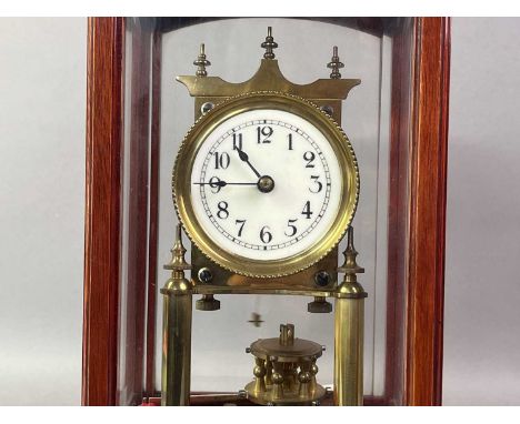 EDWARDIAN FOUR GLASS CLOCK AND A MAHOGANY MANTEL CLOCK  the four glass clock with circular white dial and Arabic numeralsthe 