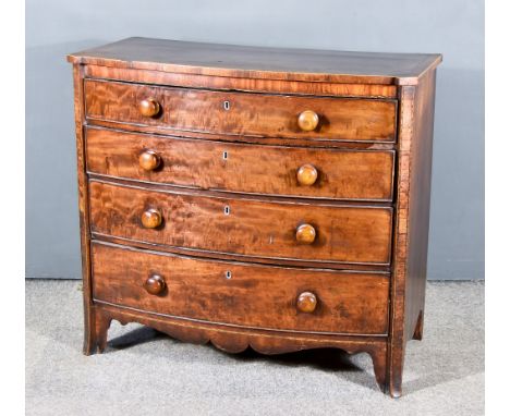 A George III Mahogany Bow Front Chest, the top inlaid with cross bandings and stringings and with square edge, fitted four lo