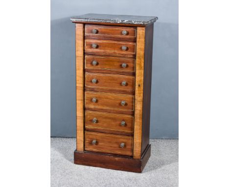 A Victorian Mahogany Wellington Chest, with grey and white veined marble slab to top, fitted seven drawers and locking stile,