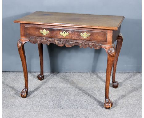 A 19th Century Mahogany Rectangular Side Table, with moulded edge to top, fitted one frieze drawer, shaped apron under carved