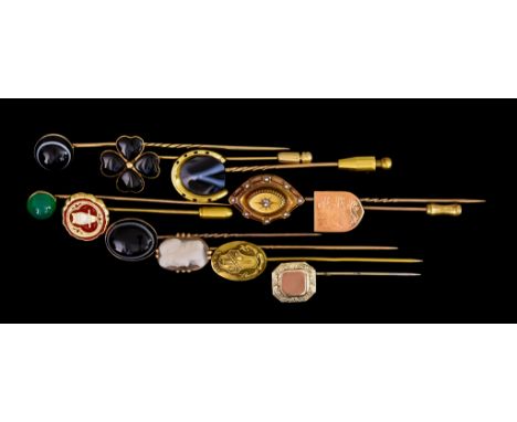 Thirty Four Mixed Stick Pins and Cravat Pins, all 9ct gold, various designs, stones and shapes, gross weight 38.3g, and a fur