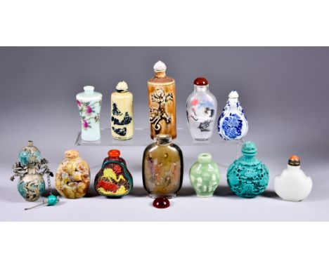 A Collection of Chinese Snuff Bottles, and some stoppers, including - a glass example, the interior painted with standing fig