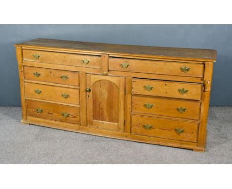 A Late 18th/Early 19th Century Pine Dresser Base, with moulded edge to top, fitted two frieze drawers, cupboard under enclose