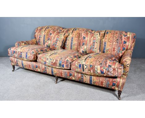 A Vintage Three Seat Settee In the "Victorian" Manner, by George Smith Ltd., the back, seats and arms upholstered in the icon