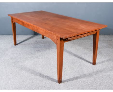 A 19th Century French Provincial Cherrywood Kitchen Table, with square edge to top, fitted slide, plain frieze, on square tap
