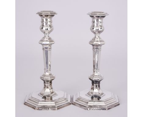 A Pair of Elizabeth II Silver Pillar Candlesticks, by Mappin &amp; Webb, Sheffield 1952, of octagonal form, with urn pattern 