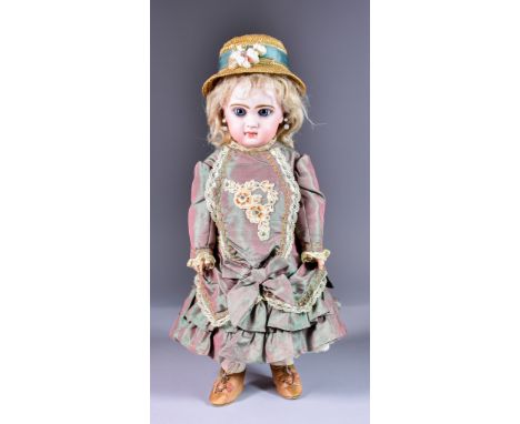 A Jumeau Tete Bebe Bisque Headed Doll, with red printed mark to back,&nbsp;with blue glass eyes and painted lashes, closed mo