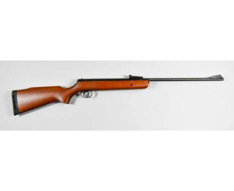 A .22 Calibre Air Rifle by BSA, Model Supersport, 17.5ins blued steel barrel with elevating sight, satin finished wood stock 