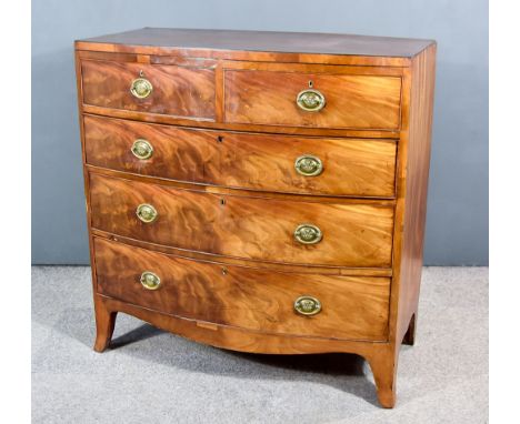 A George IV Mahogany Bow Fronted Chest, with square edge to top, fitted two short and three long graduated drawers, on splaye