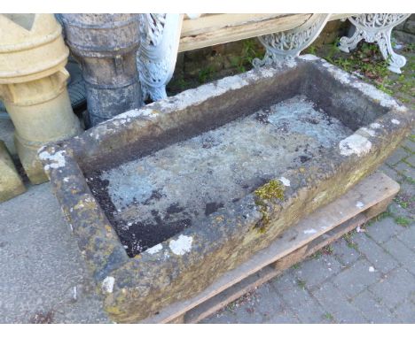 A LARGE 19th.C.CARVED STONE TROUGH OR GARDEN PLANTER.   136 x 67cms.