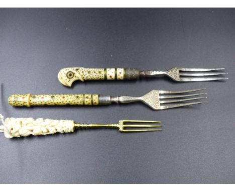 TWO EARLY FRENCH IVORY, SILVER AND ENAMEL PIQUE INLAID FORK HANDLES WITH LATER 19th.C.TINES TOGETHER WITH AN ITALIAN CARVED I