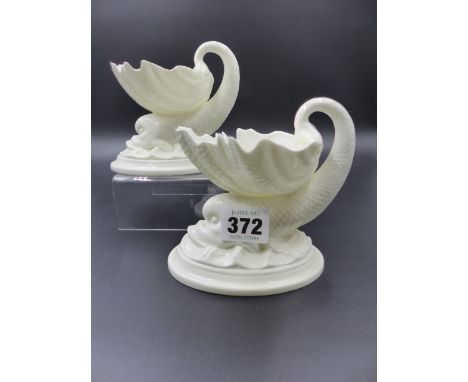 A PAIR OF ROYAL WORCESTER PEDESTAL DISHES OF SCALLOP AND DOLPHIN FORM. 
