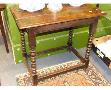 AN 18th.C.OAK SIDE TABLE WITH BOBBIN TURNED LEGS AND STRETCHER BASE.   W.80cms.