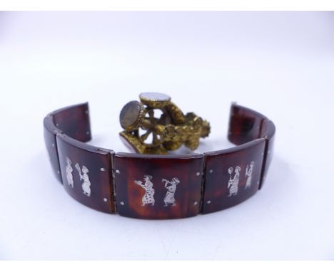 A VINTAGE TORTOISE SHELL AND WHITE METAL INLAID SIAM ART PANEL BRACELET TOGETHER WITH A ROTATING WAX SEAL MULTI STONE GILDED 