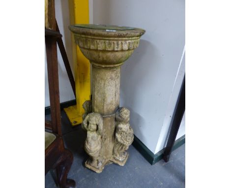 AN ANTIQUE COMPTON TYPE POTTERY PEDESTAL SUNDIAL DECORATED WITH FIGURES DEPICTING THE SEASONS.