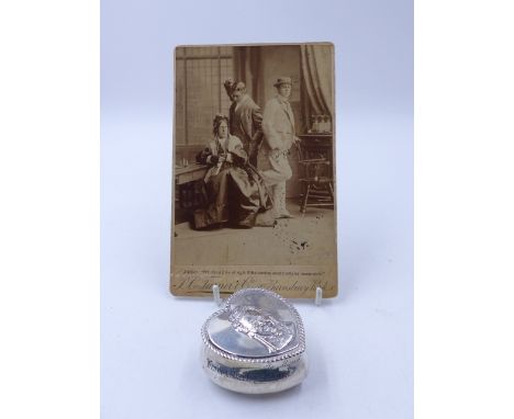 A SILVER HALLMARKED HEART SHAPED BOX WITH COVER DEPICTING A PORTRAIT OF W.S.PENLEY  TOGETHER WITH A PHOTO OF PENLEY IN  CHARL