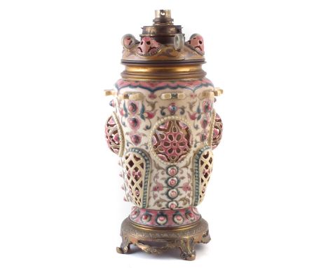 Zsolnay Pecs oil lamp, reticulated body decorated in gilt, turquiose and pink, converted to electric fitted on brass base, 38