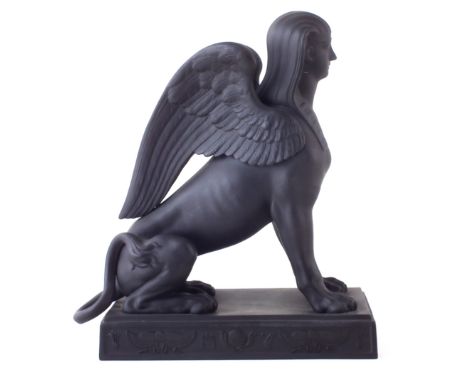 Wedgwood black basalt sphinx modelled seated on rectangular base moulded with Egyptian iconography impressed marks to base, 2