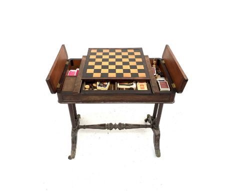 A William IV rosewood games table, the central section sliding to reveal a backgammon board, the top also reverses as a chess