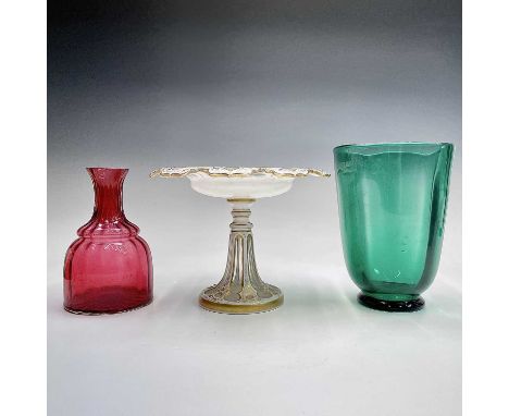 A 19th century white overlay and gilt glass tazza, on pedestal foot, height 18cm, diameter 24cm, together with a green glass 