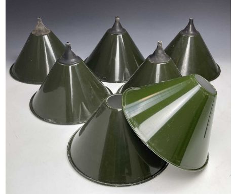 A set of seven green enamel on metal light shades, diameter 26cm. 