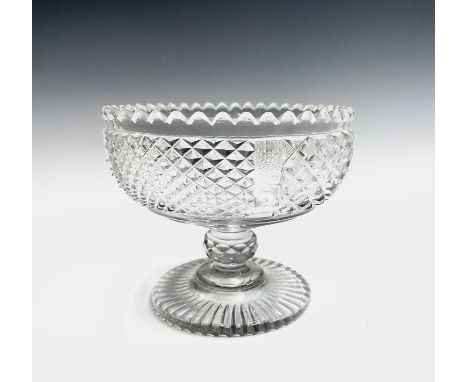 A 19th century cut glass pedestal bowl with hobnail cut decoration beneath the serrated rim. Height 13cm.Provenance:Michael T