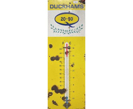 An enamel on metal advertising sign with thermometer for Duckham's Motor Oil, with laurel emblem for Triumph, maker Burnham -