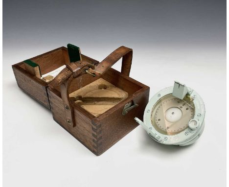 A Royal Navy magnetic unmounted compass, with broad arrow mark, diameter 10.5cm, cased, together with a dry card gimbal compa