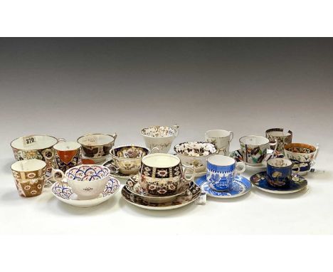 A Spode teacup and saucer, with floral and gilt decoration, a similar Derby cup and saucer and others (box).Provenance:Michae