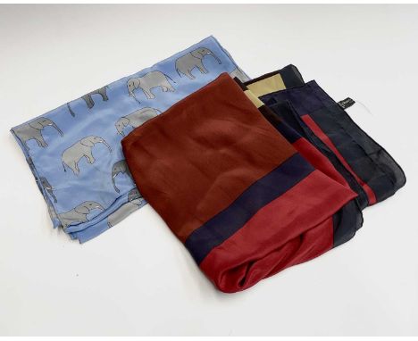 A Georg Jensen silk scarf with striped pattern, 195cm x 88cm; together with a Charlotte Sparre Denmark silk scarf decorated w